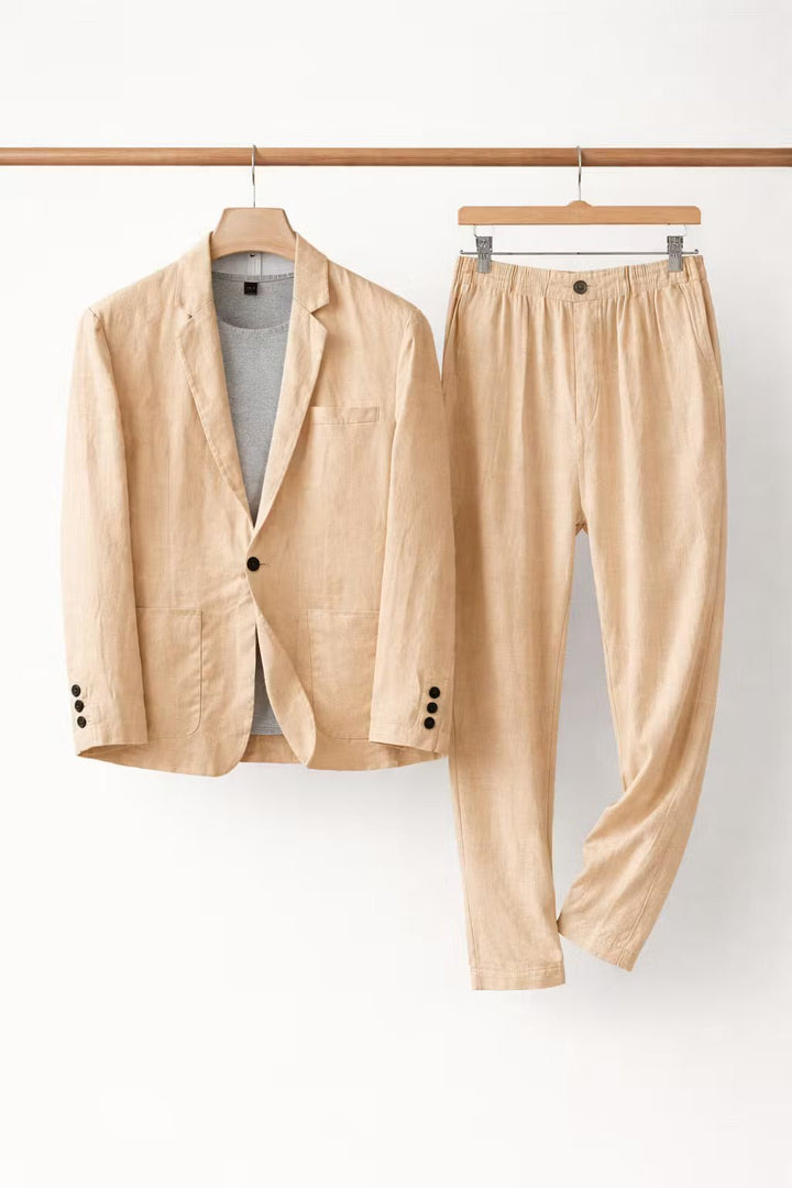 Side view of men's relaxed fit suit showing stylish drape of the two-piece blazer & comfortable trousers.