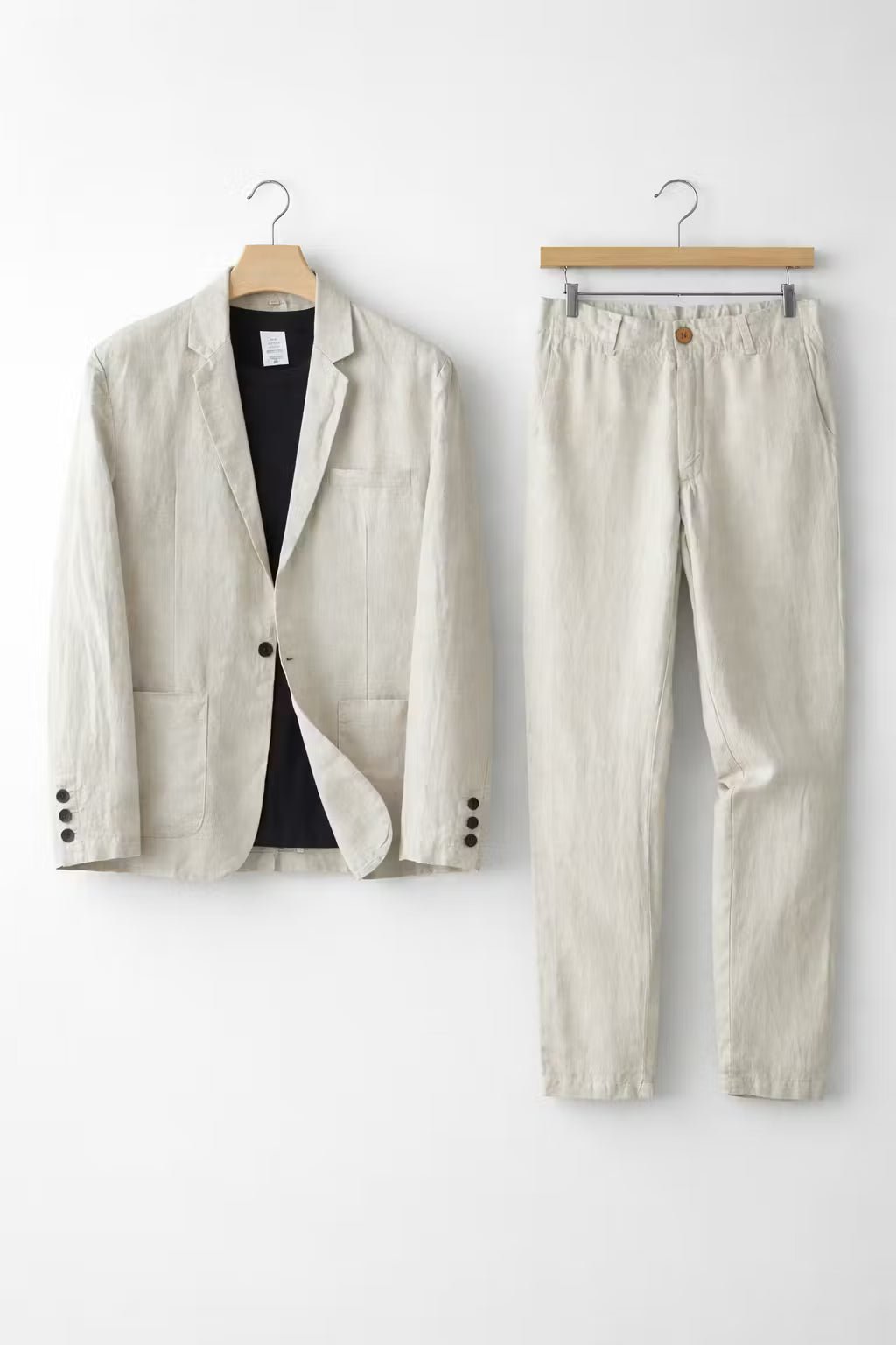 Modern men's relaxed fit suit. Comfortable blazer & trousers create a stylish, adaptable two-piece ensemble.