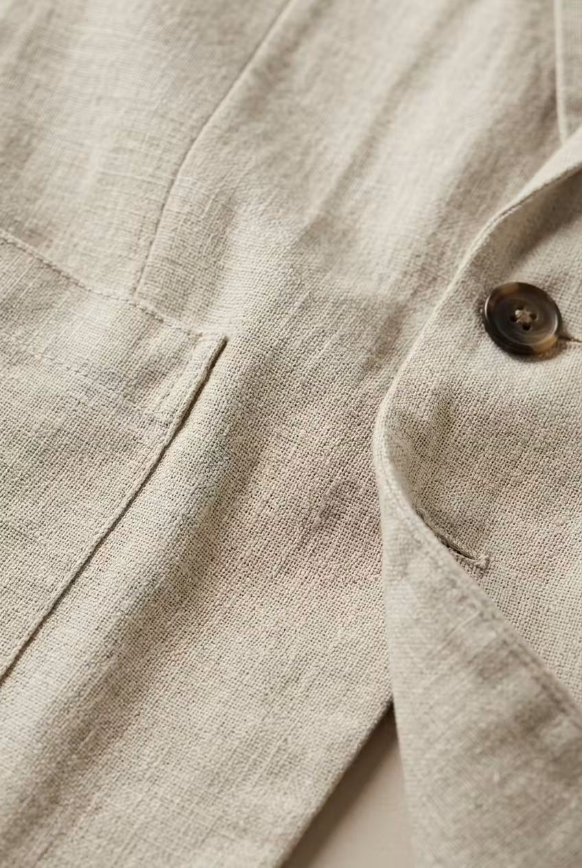 Versatile men's smart casual suit. Two-piece relaxed fit blazer & trousers suitable for various events.