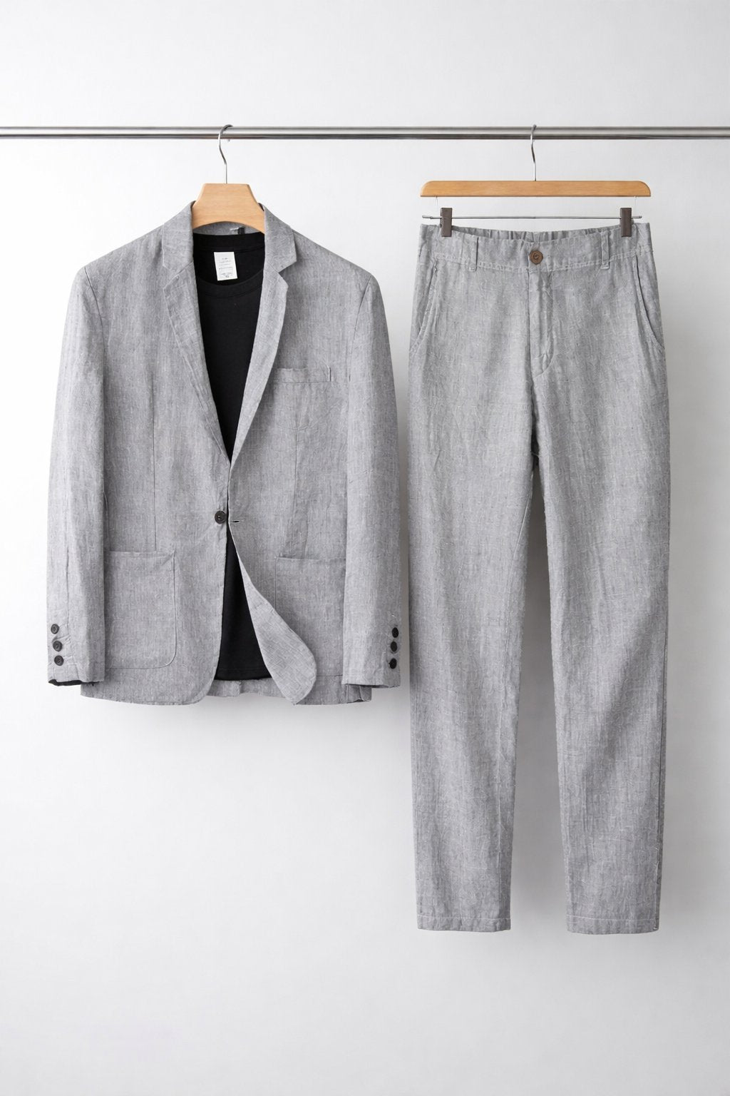 Front view of a men's relaxed fit two-piece suit, featuring a comfortable blazer & matching trousers.