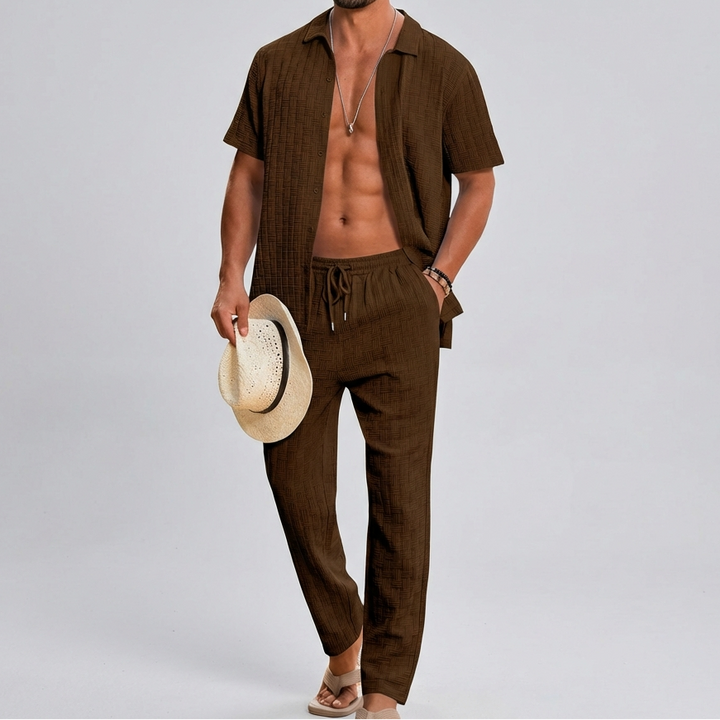Men's summer co-ord set with a textured shirt & relaxed trousers for warm weather fashion.