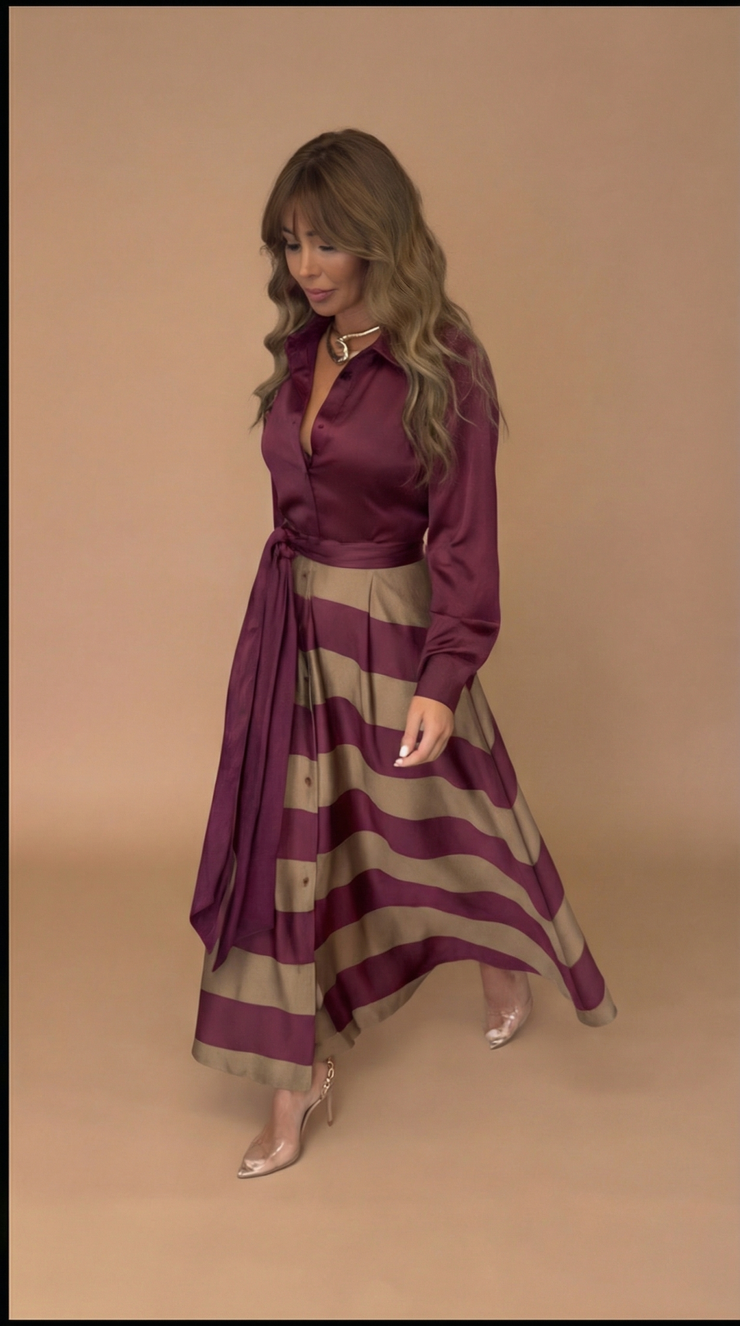 Full length women's elegant bow detail maxi dress, a comfortable & stylish choice for day or evening.