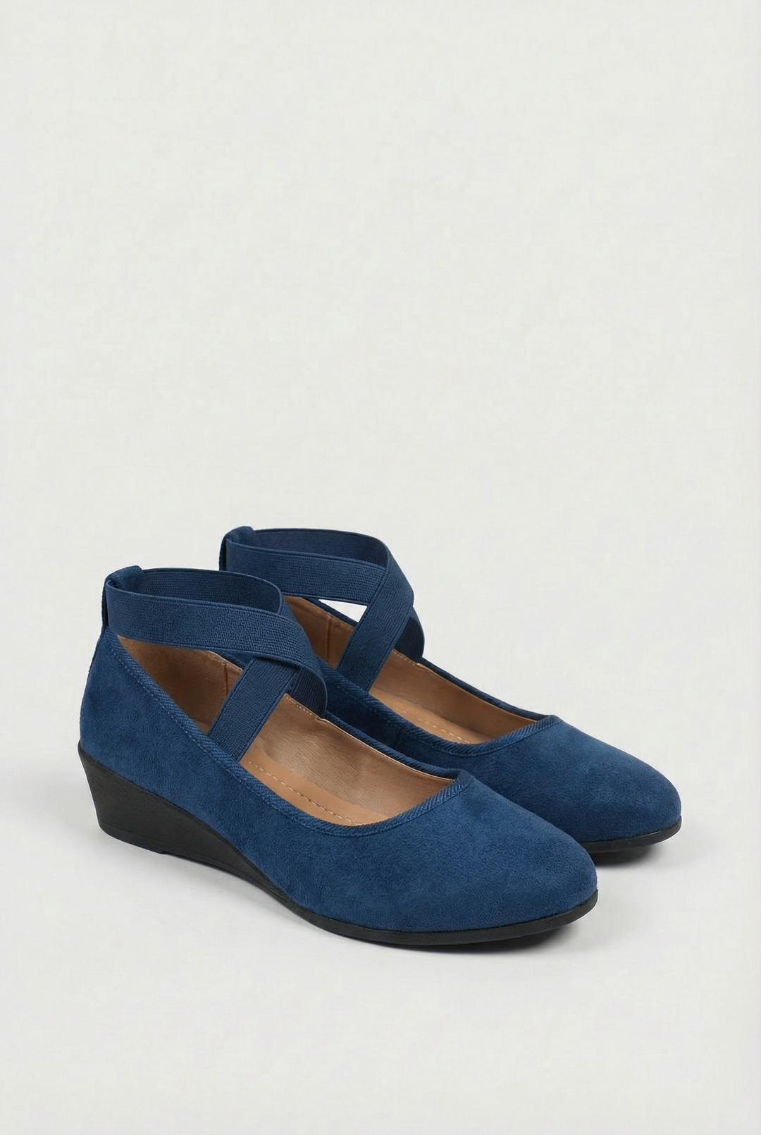 Women's cushioned slip-on walking shoes. Comfortable, easy wear casual flats for everyday activities.
