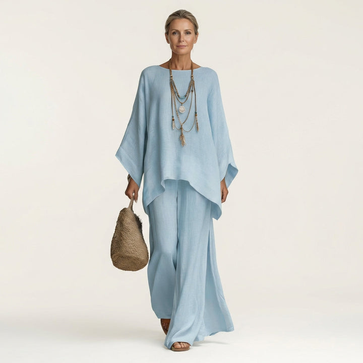 Stylish women's linen blend two-piece set with a boho design. Relaxed wide-leg pants and matching top for summer.