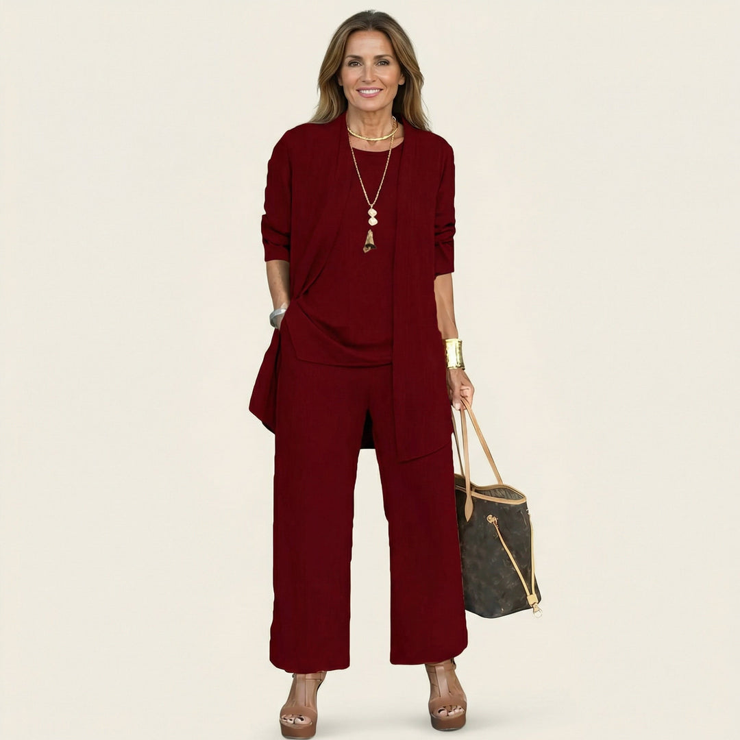 Coordinated women's minimalist 3-piece matching set: a chic vest, crisp blouse & comfortable wide-leg trousers.