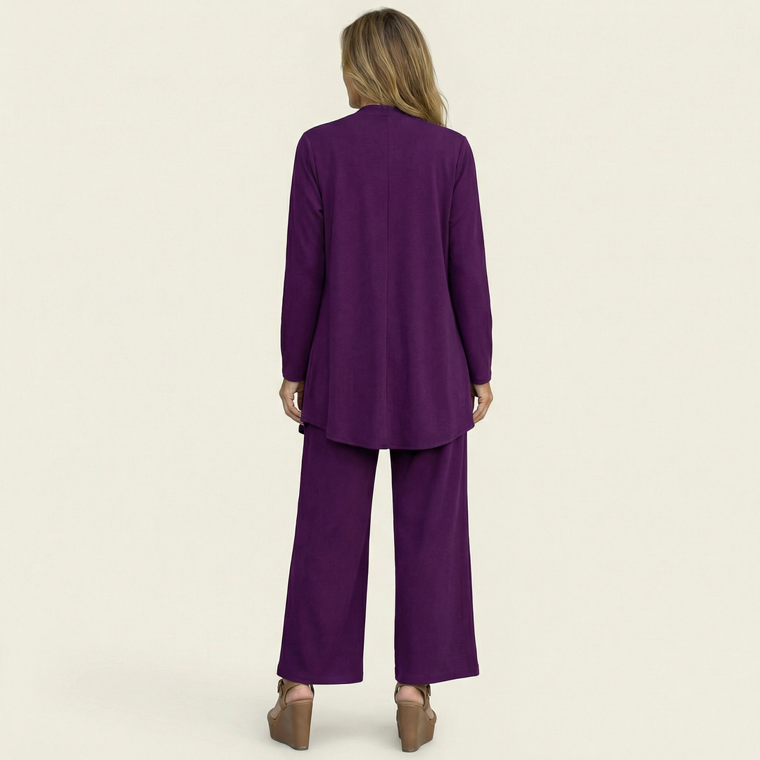 Stylish women's minimalist 3-piece matching set including a sleeveless vest, long-sleeve blouse & wide-leg pants.