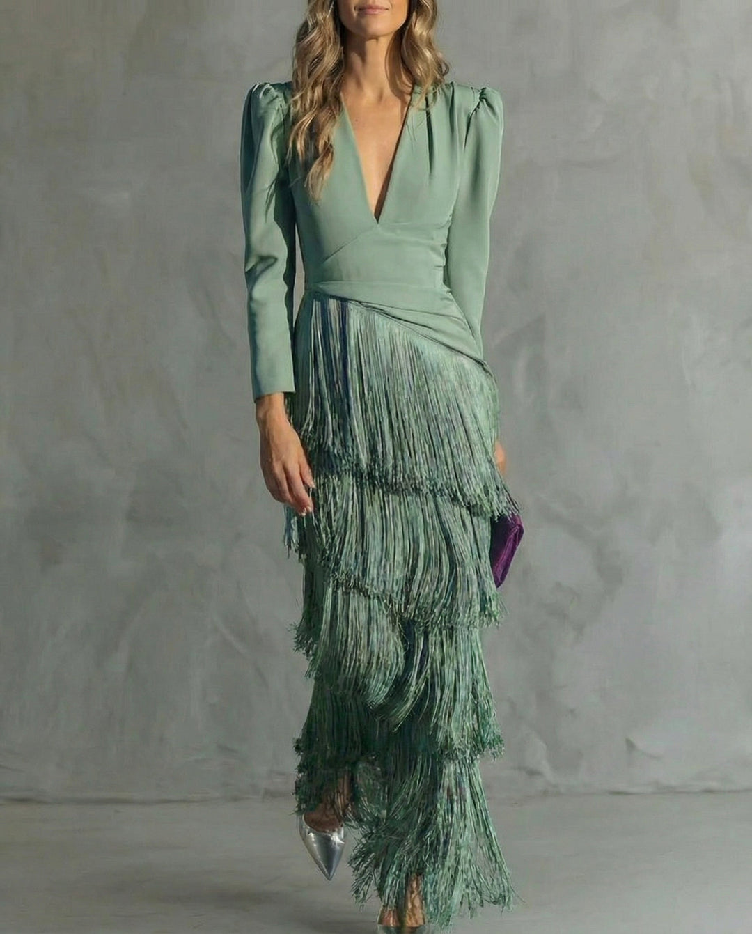 Women's elegant V-neck long sleeve midi dress. Features a flowy silhouette & distinct fringe sleeves for parties.