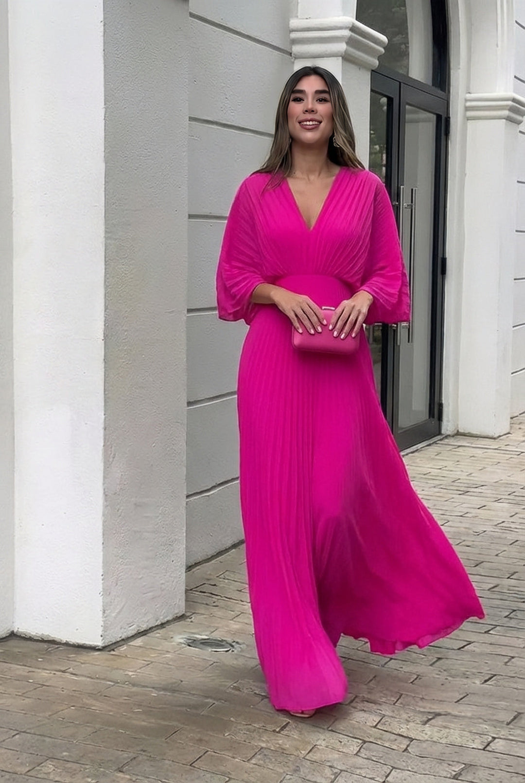 Modern elegant pleated maxi dress for women with graceful kimono sleeves, perfect for formal wear.
