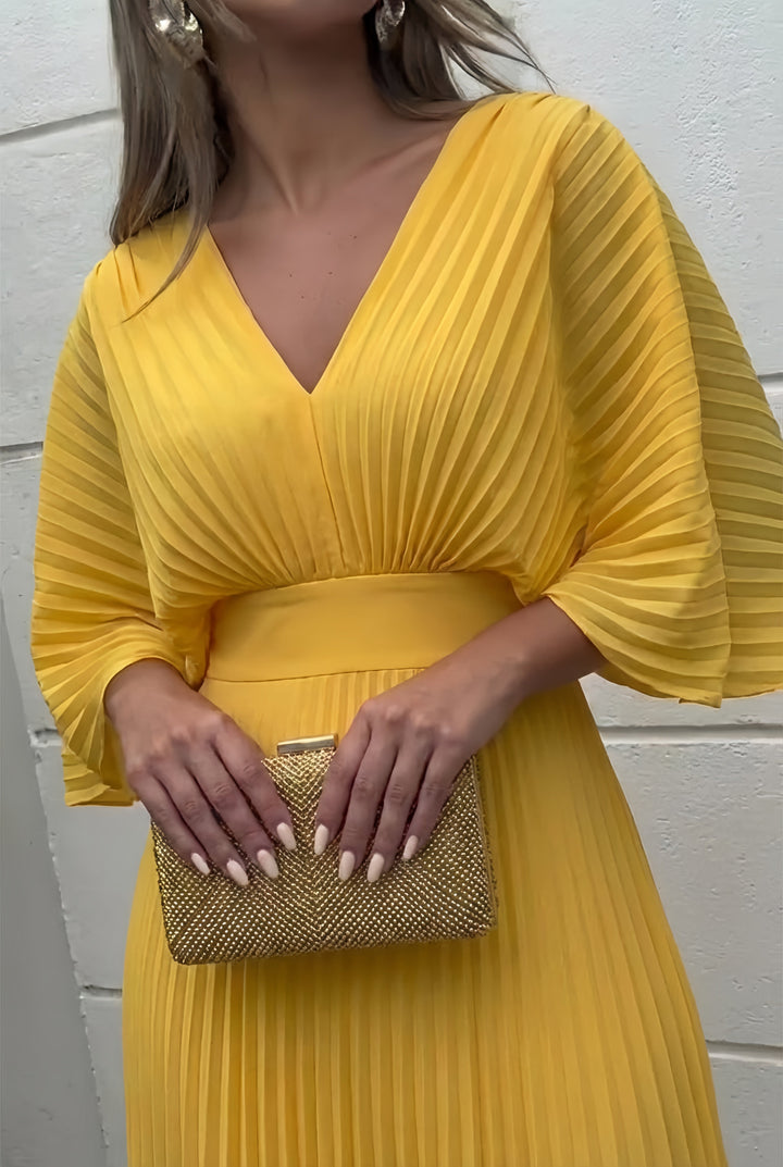 Stylish women's pleated maxi dress with elegant kimono sleeves, offering a sophisticated look.