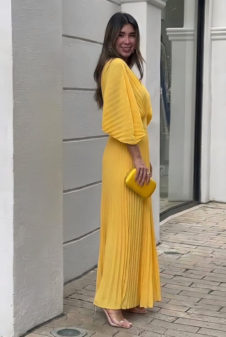 Sophisticated long pleated maxi dress for women, featuring a flattering V-neck and elegant kimono sleeves.