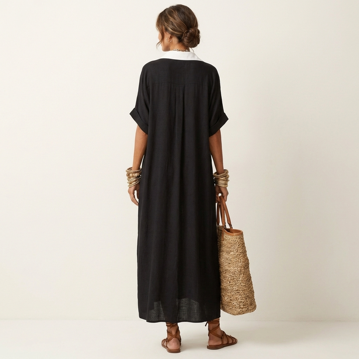 Sophisticated women's shirt dress: a long maxi design with striking contrast collar & practical button front.