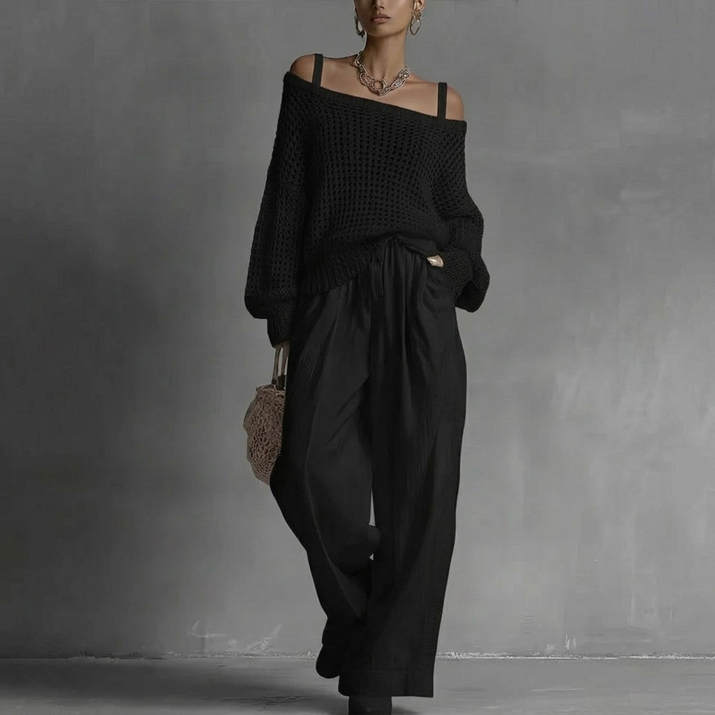 Elegant women's off-shoulder top and matching relaxed fit pants, a stylish two-piece set for summer.