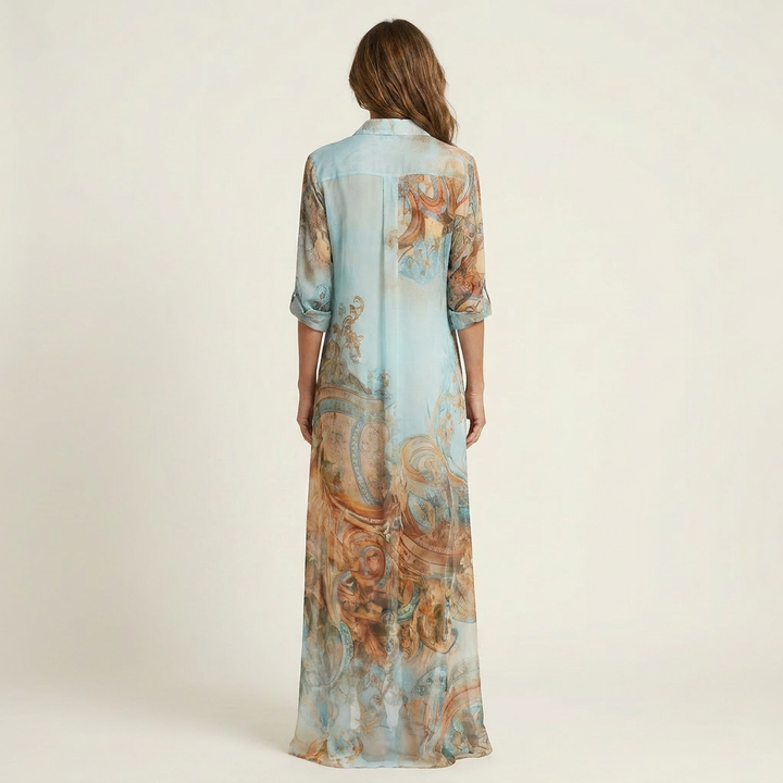 Stylish women's printed maxi dress with an intricate baroque pattern, perfect for elegant events & resort wear.
