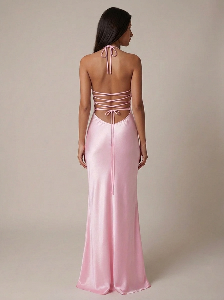 Women's elegant pearl beaded halter neck maxi gown with lace-up back, perfect for formal events.