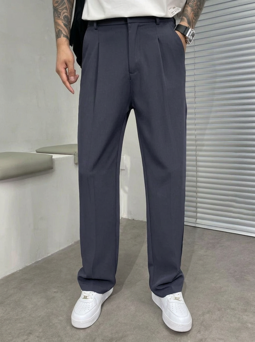 Detail of waistband and pockets on men's wide-leg dress trousers, designed for comfort and sleek, modern men's fashion.