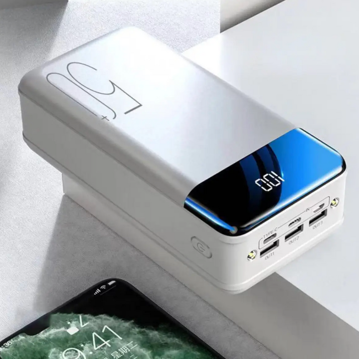 "High capacity portable power bank, sleek black design, for charging phones, tablets, and laptops on the go efficiently."