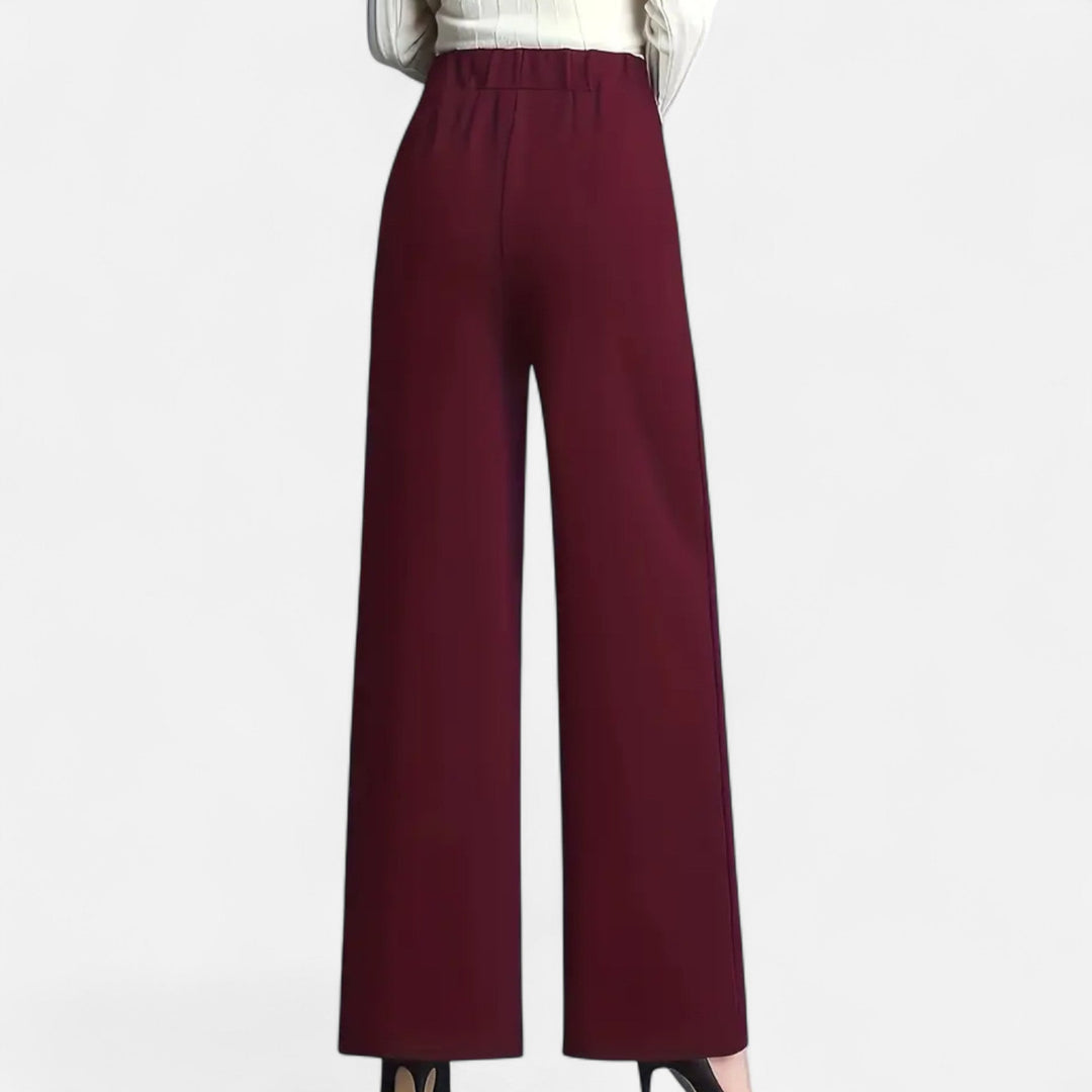 Effortless high-waist wide-leg women's trousers, providing comfort and a chic, flattering silhouette.