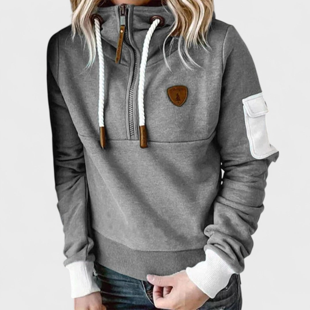 Black women's soft knit jumper. Zip neck design, perfect everyday essential for comfort & style.
