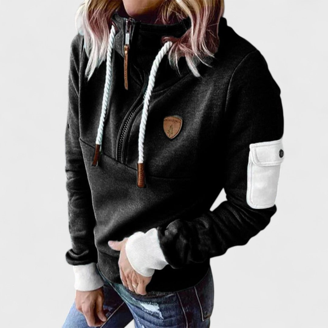 Women's soft knit sweater, cozy top with modern zip neck. Relaxed fit for comfortable everyday fashion.