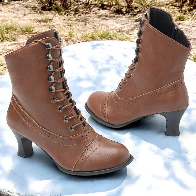 Women's stylish Victorian mid-heel lace-up boots with convenient zipper, perfect for fashion and comfort.
