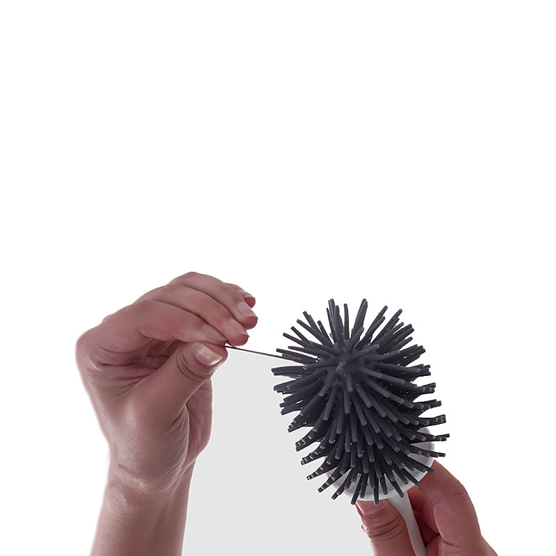 "Hygienic silicone toilet brush with holder, non-scratch bristles, white handle, wall-mounted and floor-standing options."