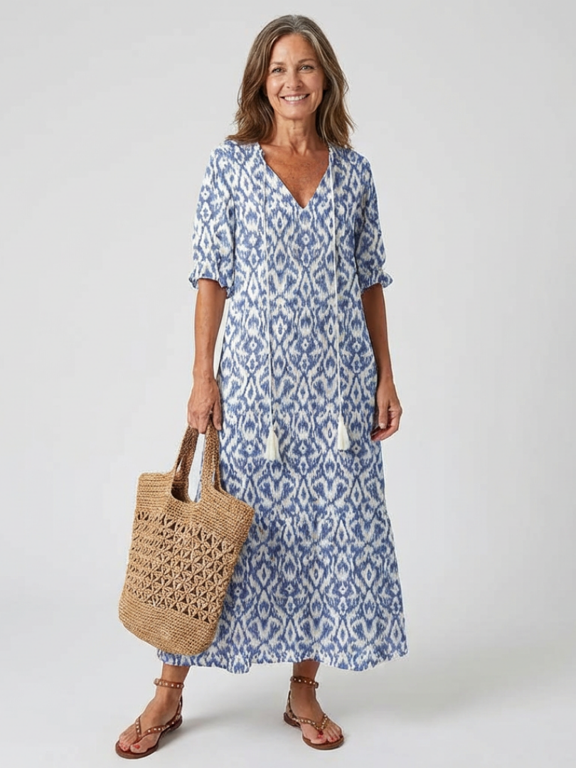 Women's floral V-neck midi dress with short sleeves, perfect for casual summer wear. Comfortable & relaxed fit.