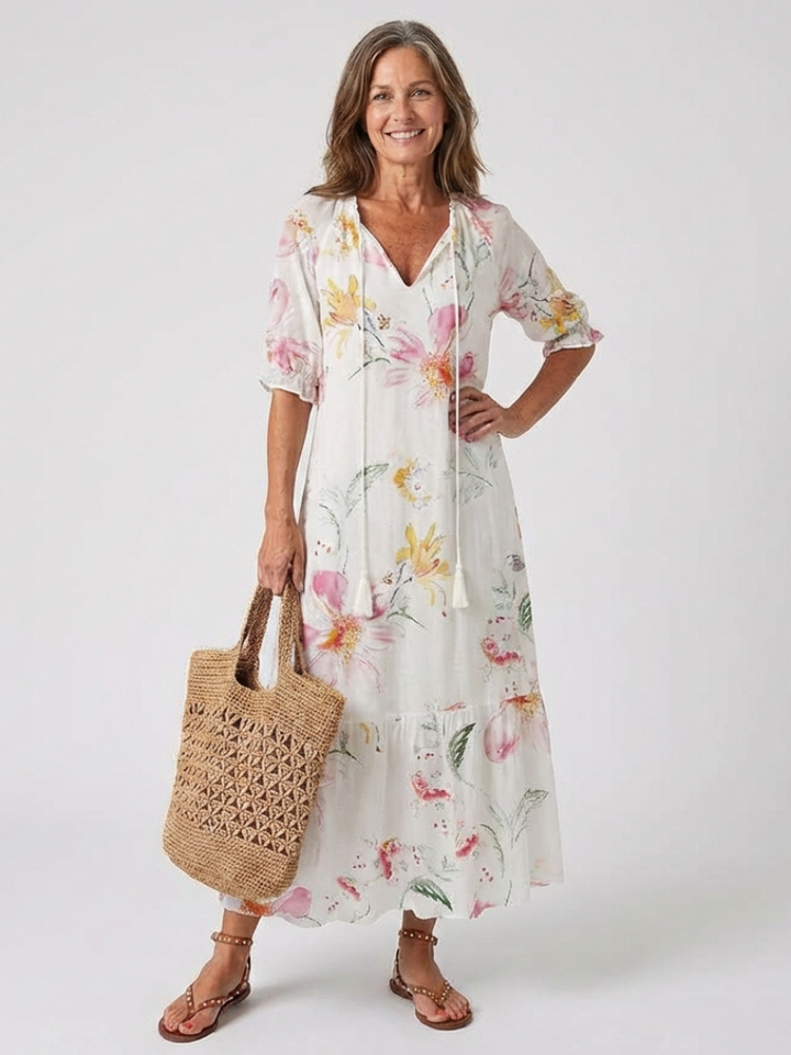 Comfortable women's floral midi dress with V-neck & short sleeves. Relaxed fit, great casual or summer dress.