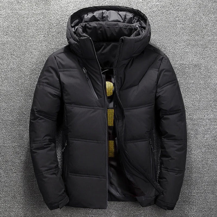 Men's warm hooded quilted puffer jacket in black, ideal for winter outerwear and cold weather. Zip front closure.