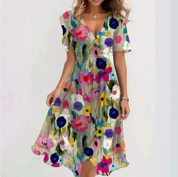Stylish women's V-neck short sleeve summer midi dress. Perfect flowy casual fashion.