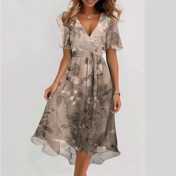 Comfortable women's flowy V-neck short sleeve summer midi dress. Effortless style.
