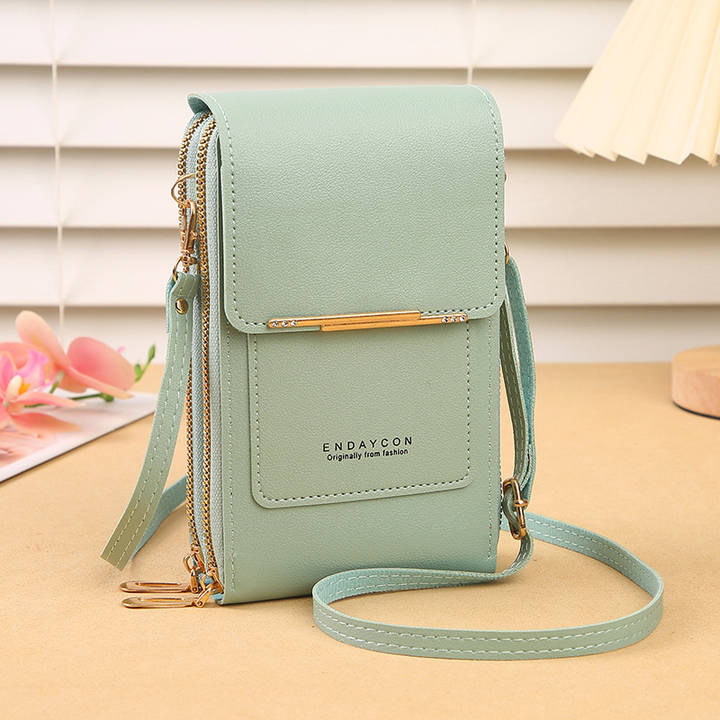 Modern women's travel-friendly phone crossbody bag, designed with a secure touchscreen pocket and essential wallet features.
