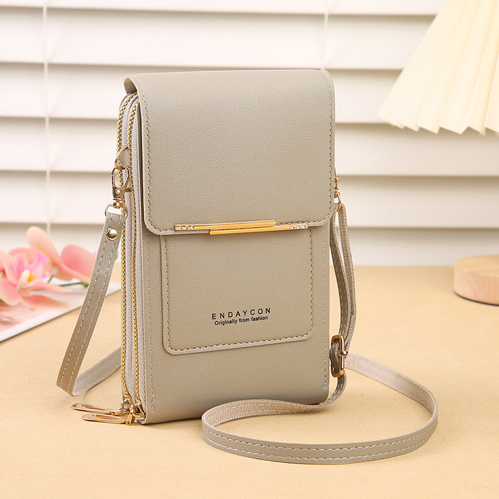 Stylish women's compact crossbody purse with a front touchscreen window for phone access & built-in wallet organizer.