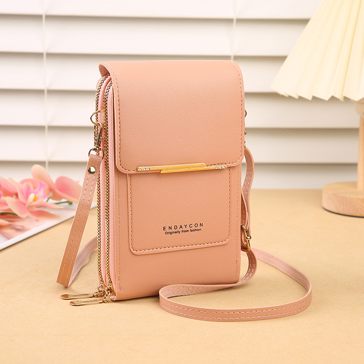 Small women's touchscreen phone crossbody bag. Securely holds your smartphone & essentials for daily errands.