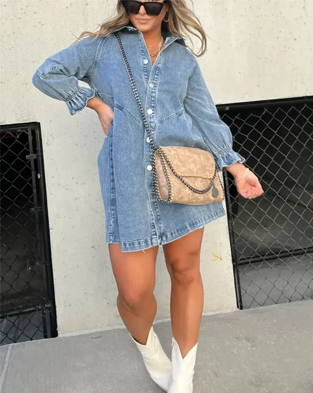 Versatile button-down denim mini dress for women, offering a modern and relaxed fit.