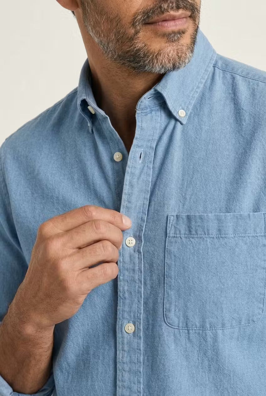 Men's relaxed fit chambray shirt for everyday comfort. Long sleeve button-up for versatile styling.
