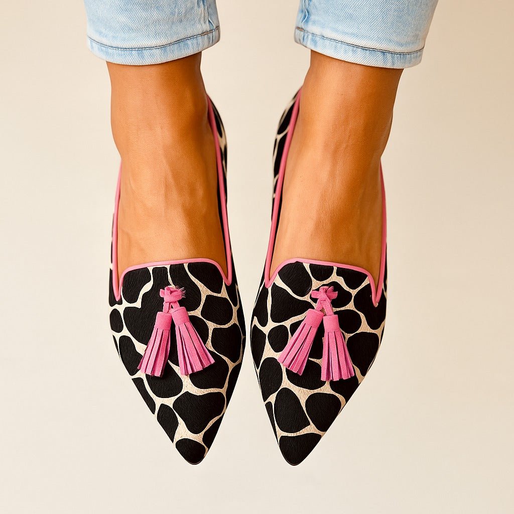 Stylish women's patterned slip-on tassel loafers, perfect for casual or dress wear. Comfortable closed-toe flats.