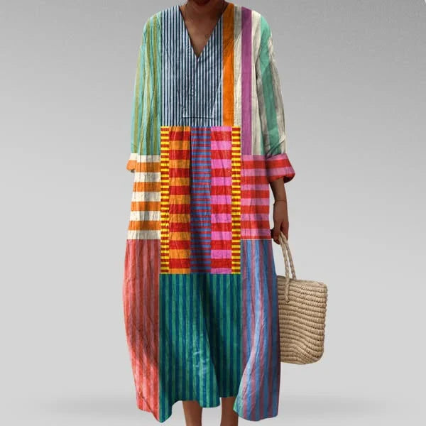 Comfortable women's midi dress with V-neck & unique geometric design. Ideal elegant summer or casual stylish wear.
