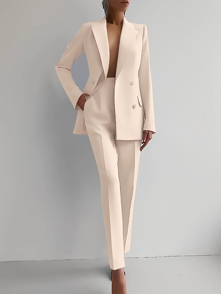 Comfortable women's suit set. This two-piece outfit with tapered trousers is great for work or leisure.