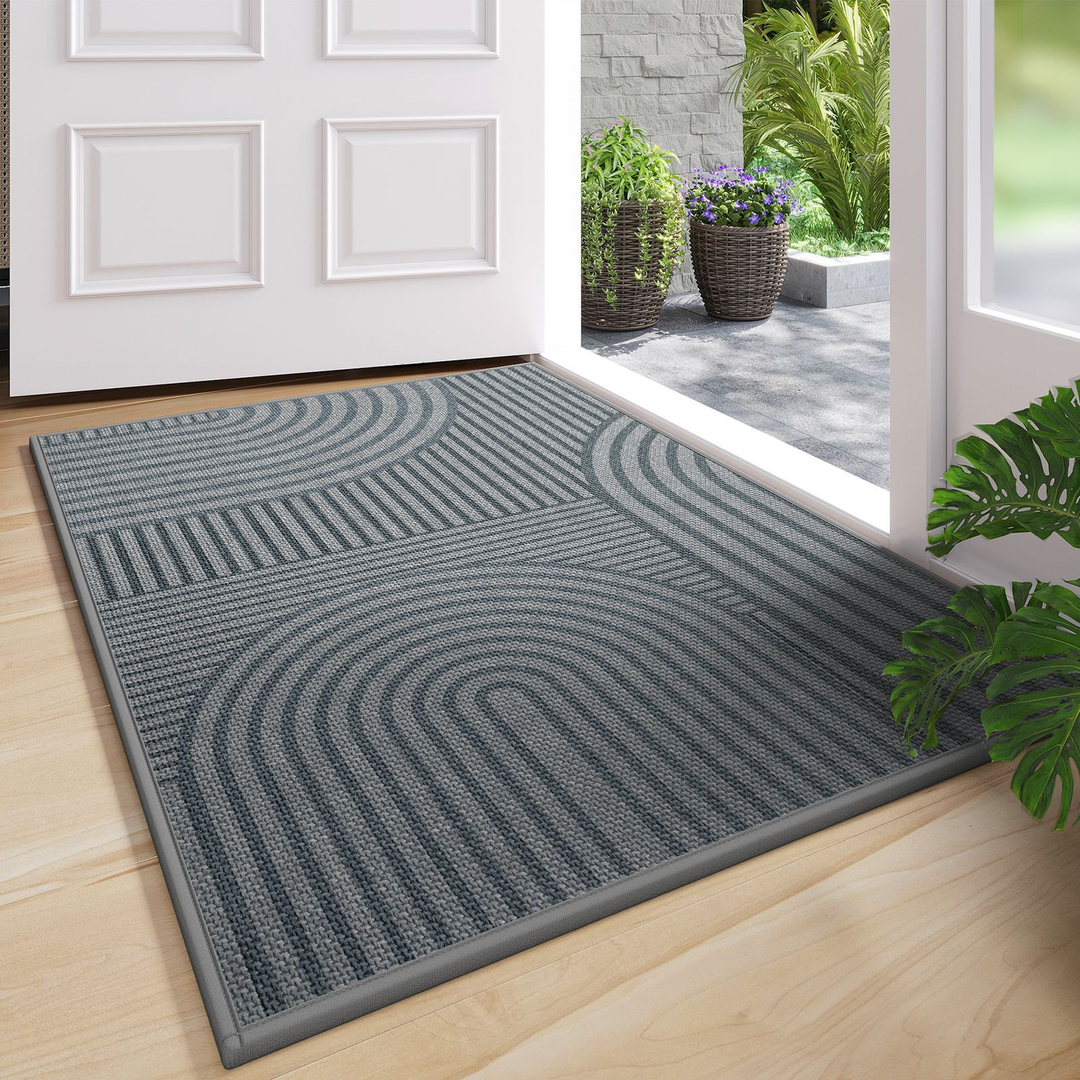 Washable beige anti-slip ribbed entryway mat. Ideal for indoor/outdoor use, trapping dirt and protecting floors.