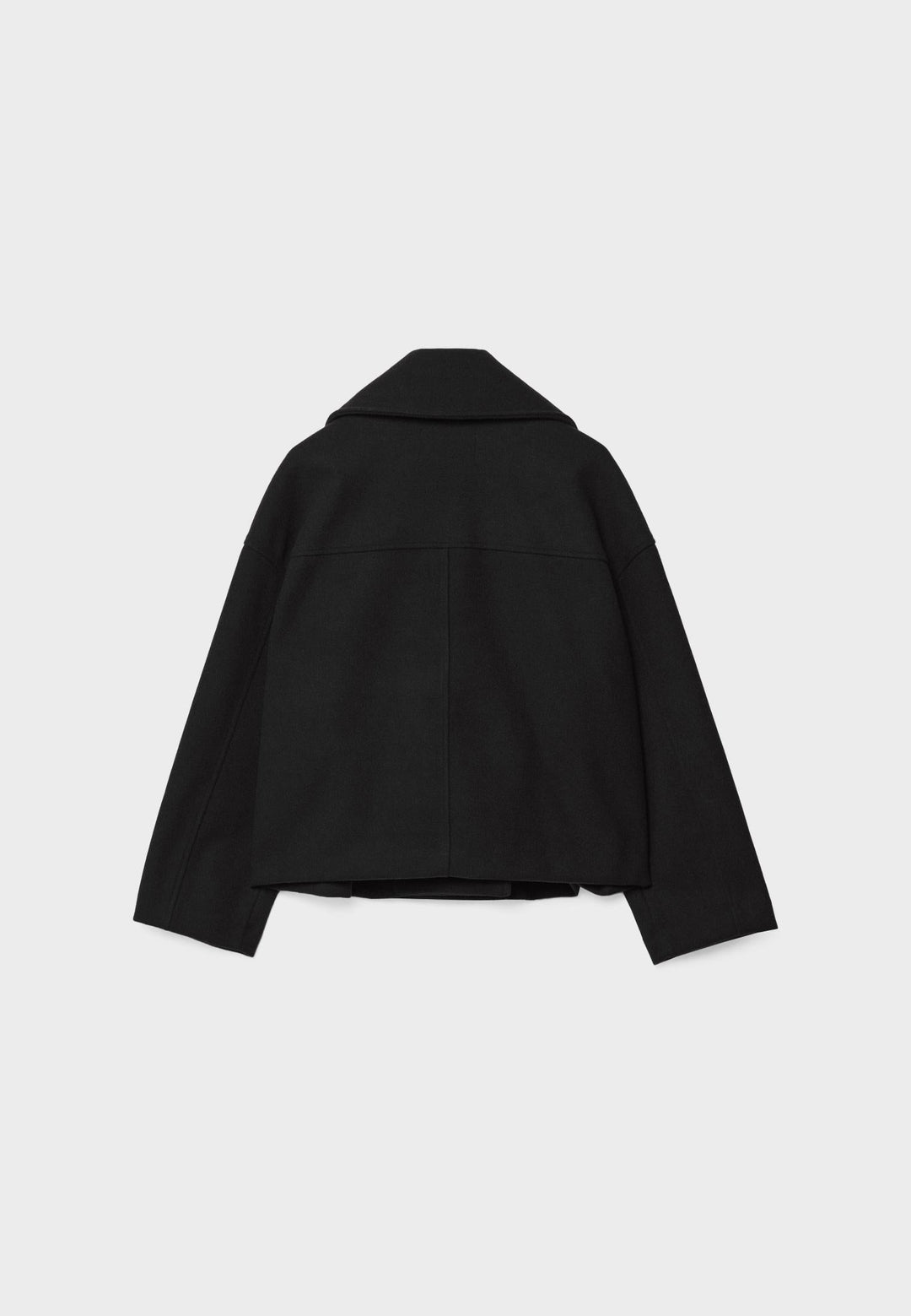 Close-up of elegant double-breasted summer jacket detail. Shows lightweight fabric & sophisticated button design.