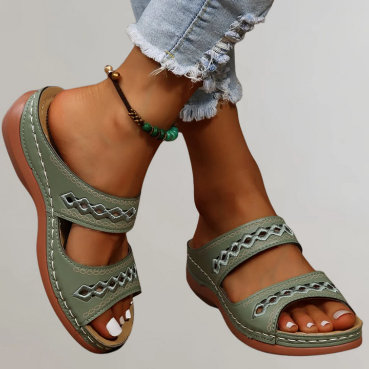 Fashionable women's sandals provide orthopedic comfort & arch support. Perfect for stylish summer walks.