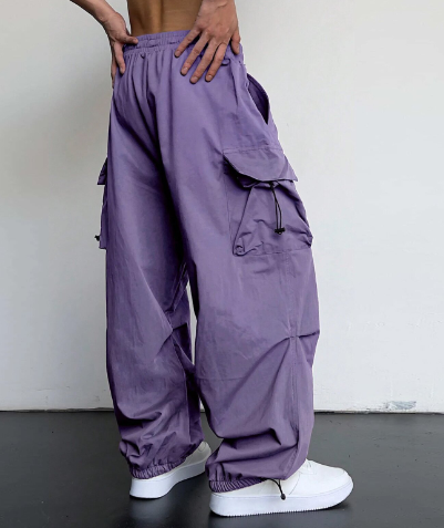 Model wearing women's wide leg cargo pants, highlighting the multi-pockets and comfortable fit for an active lifestyle.