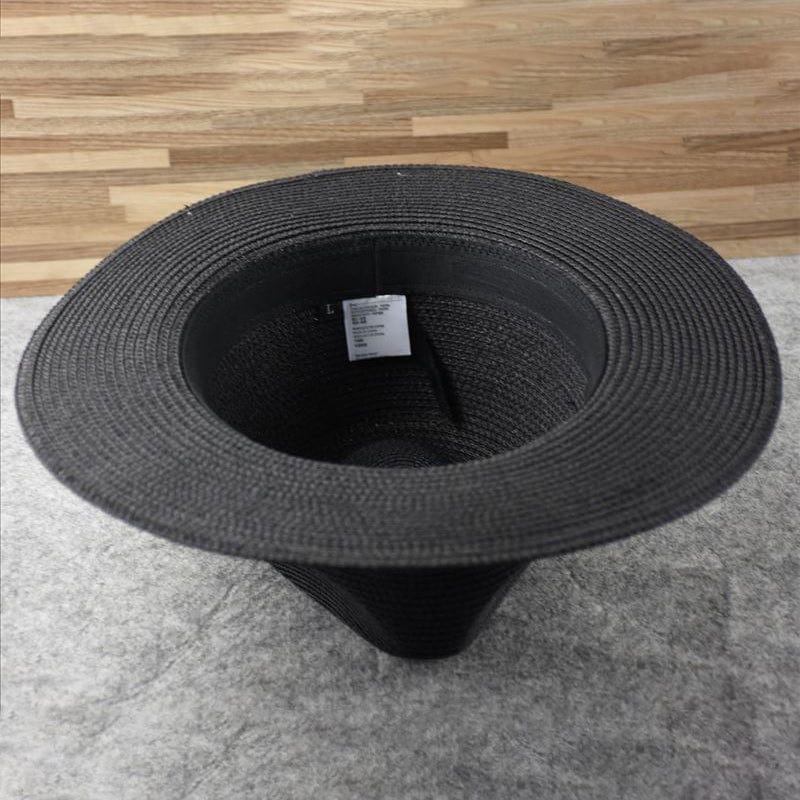 Lightweight handwoven straw Panama hat, ideal for breathable sun protection and timeless summer fashion.