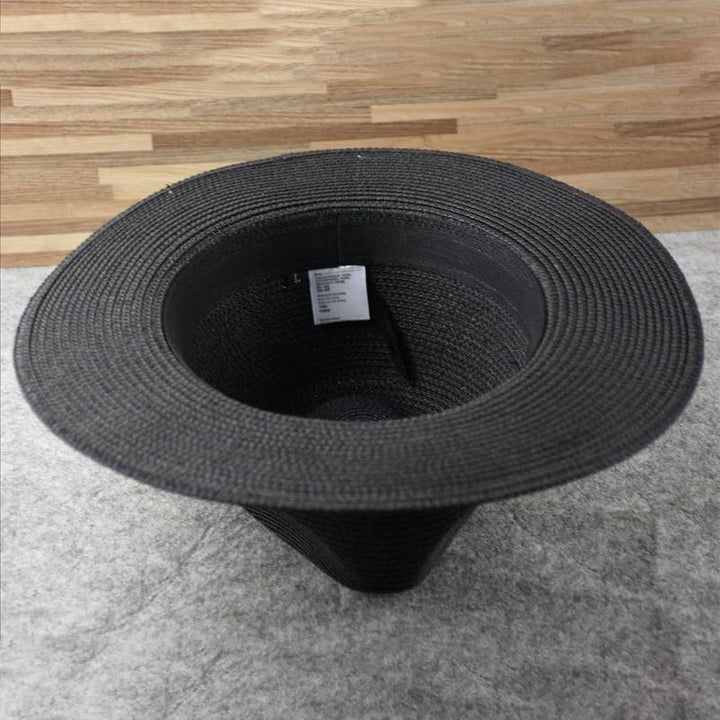 Lightweight handwoven straw Panama hat, ideal for breathable sun protection and timeless summer fashion.