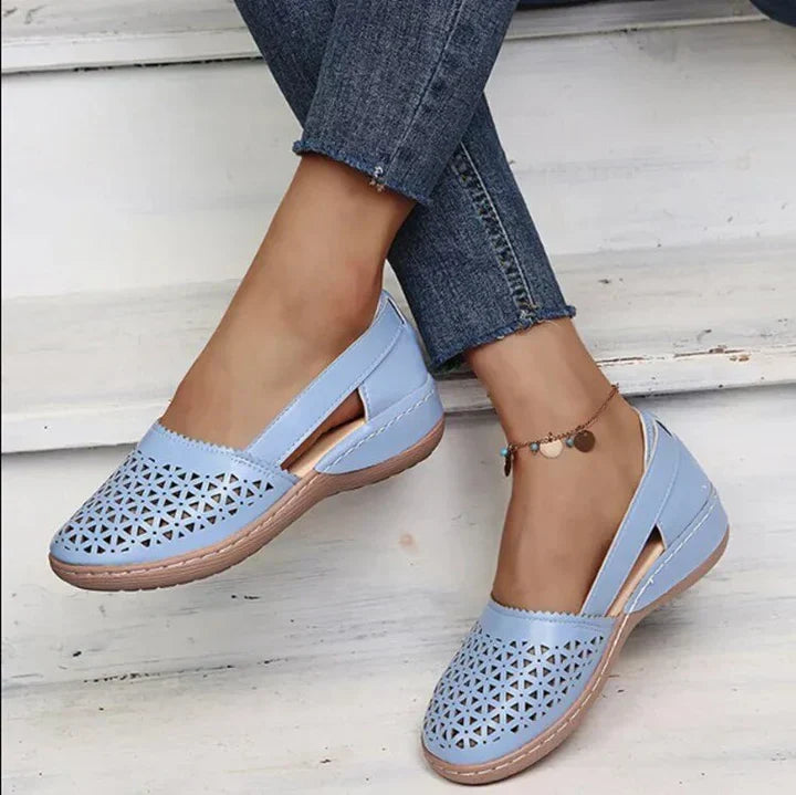 Breathable Orthobliss slingback flats with orthopedic comfort. Stylish women's footwear for all-day wear.