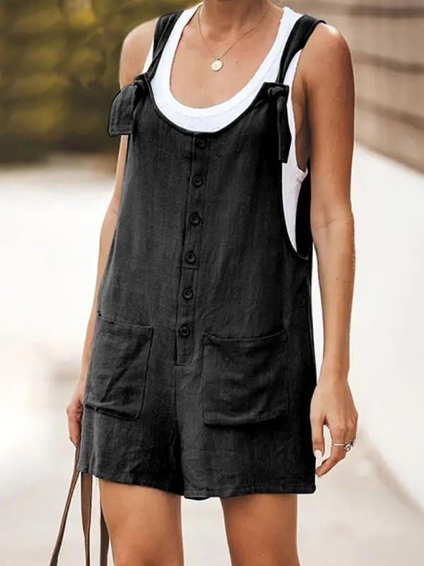 Stylish women's daisy print overall shorts, offering a fresh boho summer look.