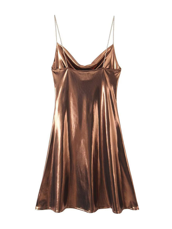 Sophisticated women's evening gown, deep back silhouette & metallic strap detail.