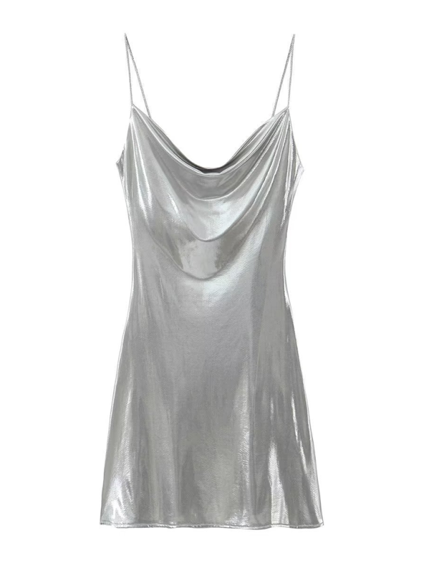 Women's seductive spring/summer dress with a deep back and stylish metallic straps.