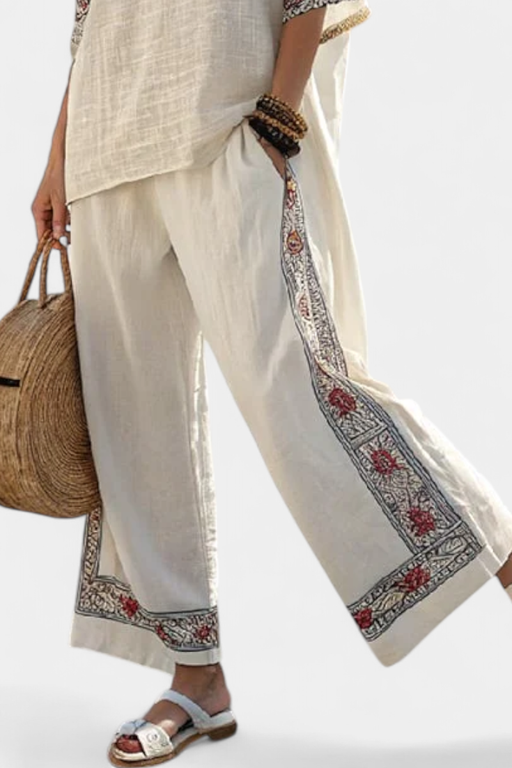 Boho chic women's two-piece set with a beautiful embroidered top & flowing wide-leg trousers for stylish comfort.
