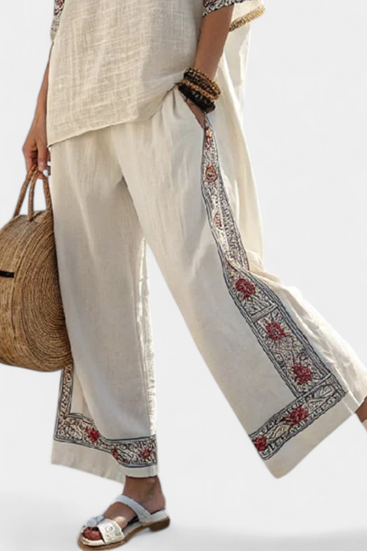Boho chic women's two-piece set with a beautiful embroidered top & flowing wide-leg trousers for stylish comfort.